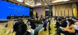 Los científicos de la Organización Mundial de la Salud durante la conferencia de prensa de hoy en Wuhan, China.